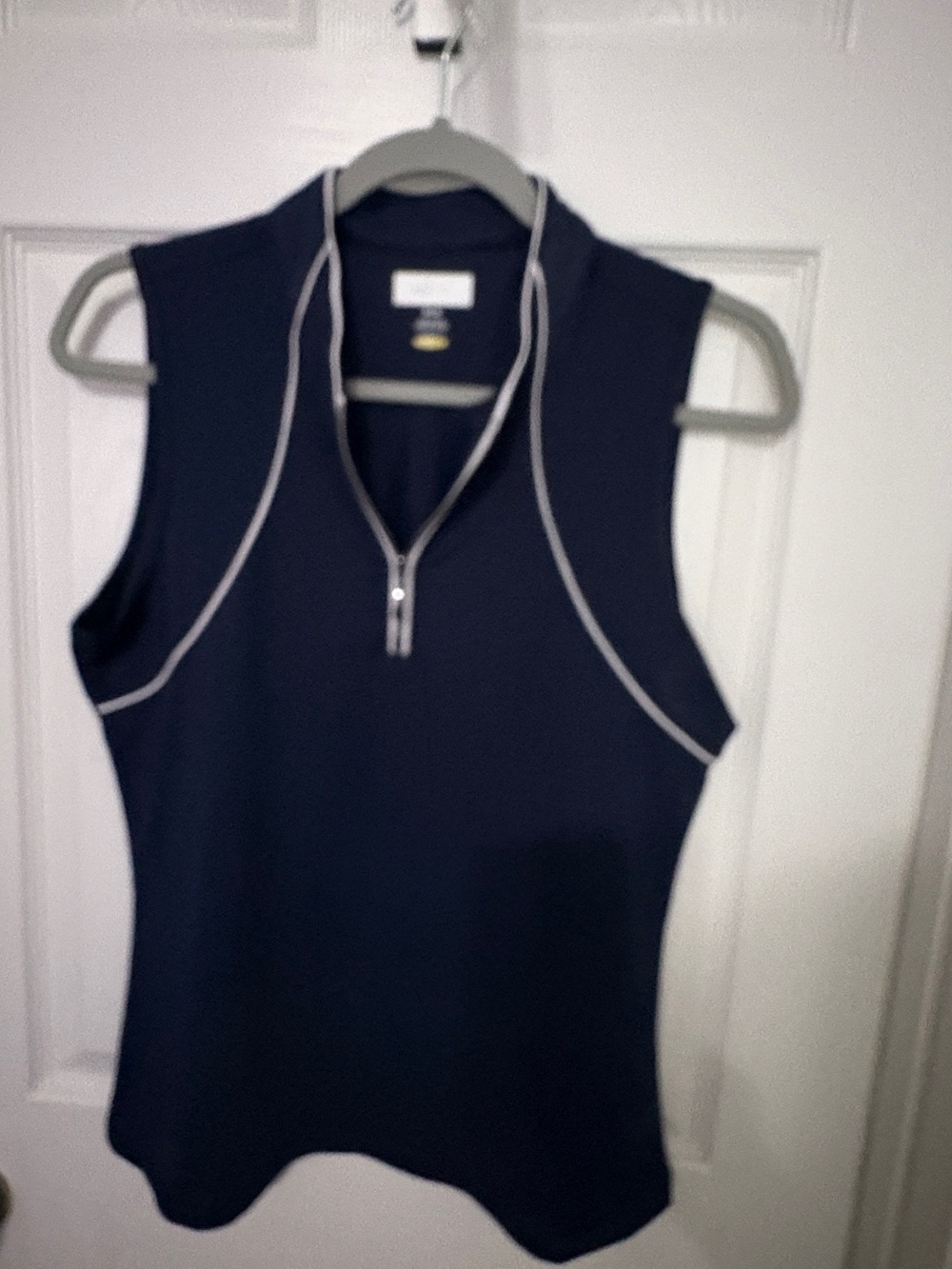 Greg Norman Collection Navy Sleeveless Zip Golf Tank with White Piping. NWOT